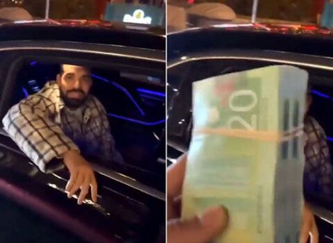 Məşhur reper küçədə insanlara pul payladı – VİDEO