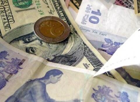 Gürcüstanın valyuta bazarı qarışdı: Banklar sürətlə dəyərsizləşir