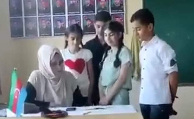 Məktəbdə dini təbliğat müzakirələrə səbəb oldu – VİDEO